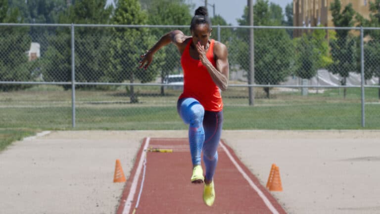janay DeLoach demonstrating the penultimate step in the long jump