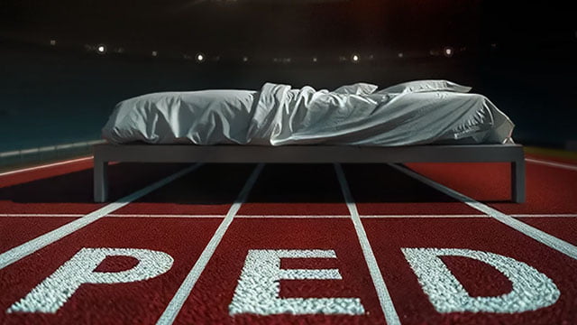 a bed on a running track with PED on the lanes