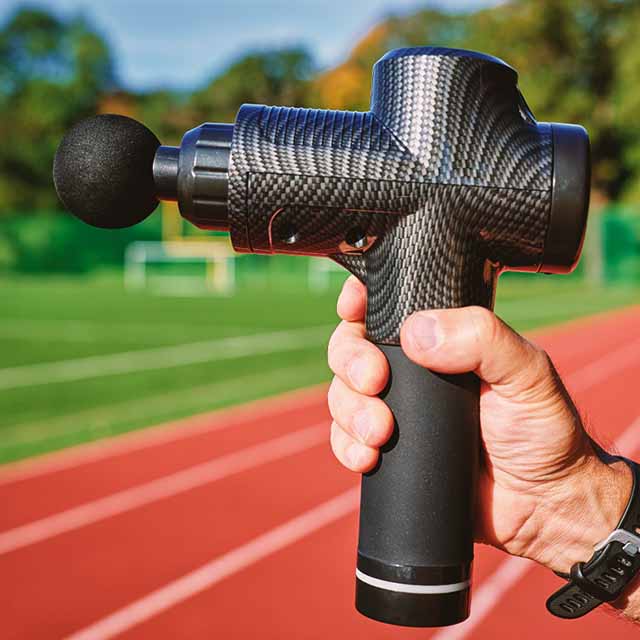 a massage gun at a track