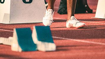 closeup of sprinters track spikes before a race