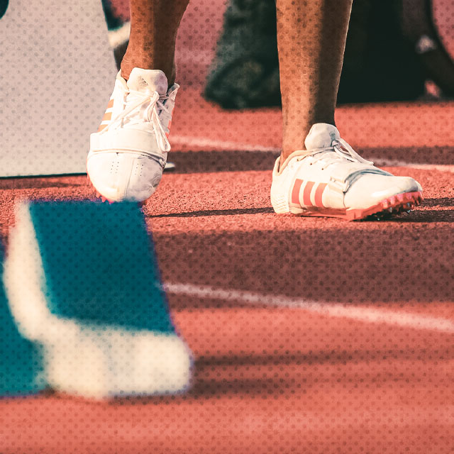 closeup of sprinters track spikes before a race