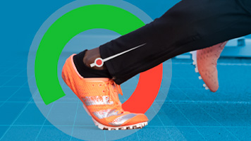 A close-up of a sprinter's foot during acceleration running on toes